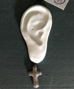 Ear shape ceramic earrings.