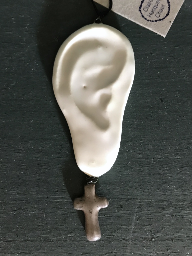 Ear shape ceramic earrings.