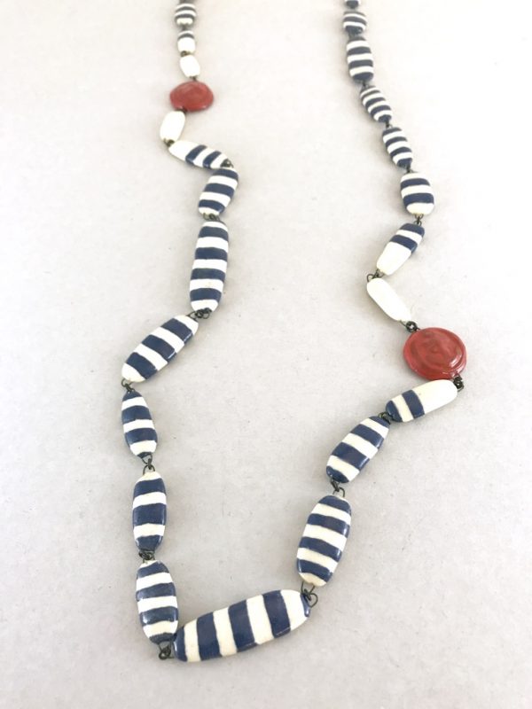 A ceramic chain inspired by sailor suit code , striped and anchor stamped beads for a free eccentric chic style.