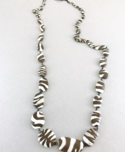 Original ceramic necklace hand made consisting of zebra patterned beads done one by one in France