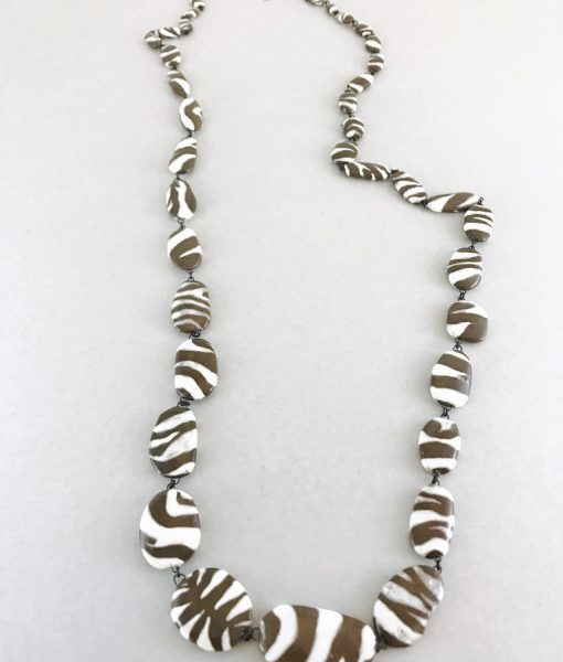 Original ceramic necklace hand made consisting of zebra patterned beads done one by one in France